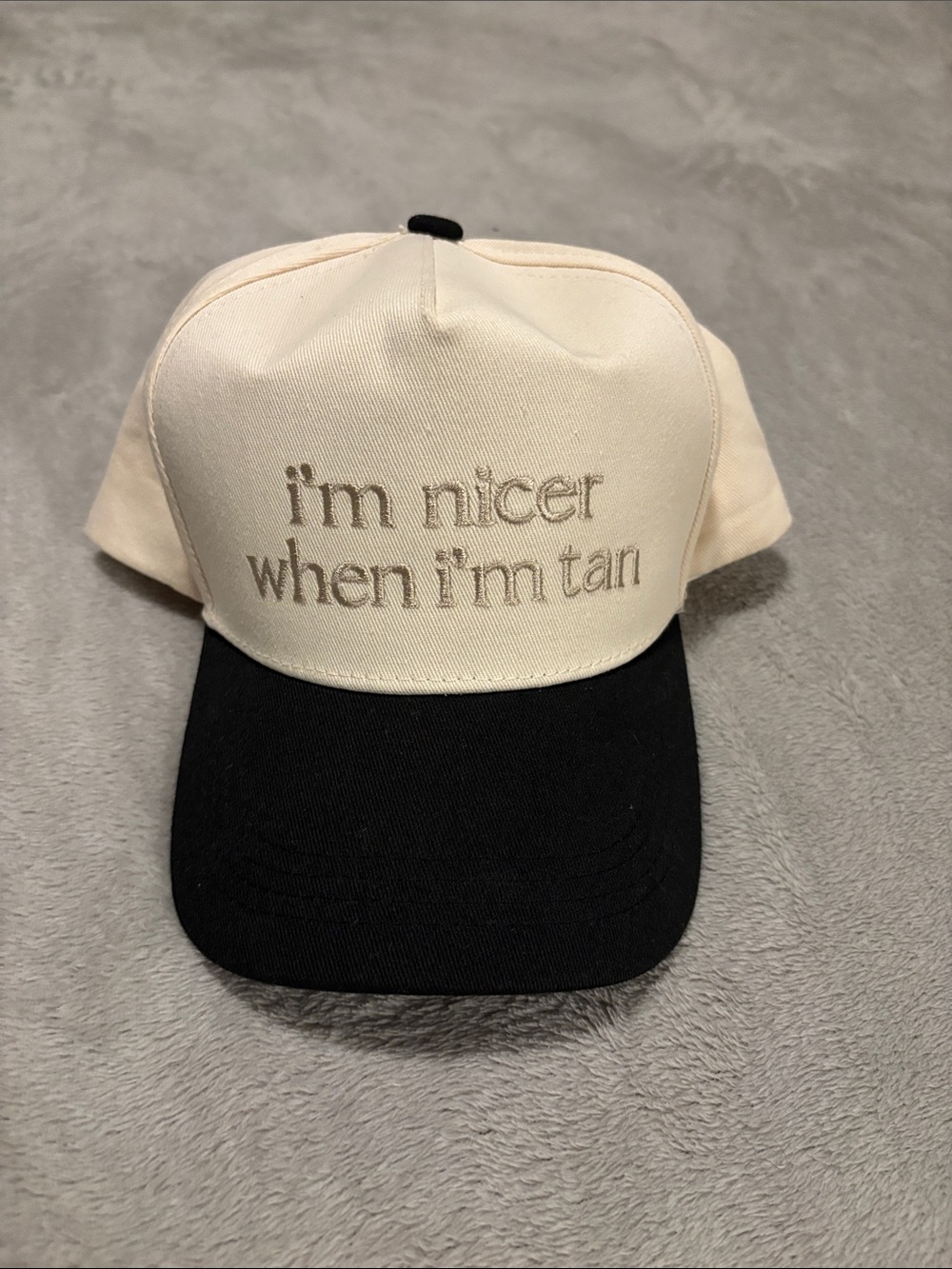 Cream and Black Trucker Hat with 'I'm Nicer When I'm Tan' Embroidery